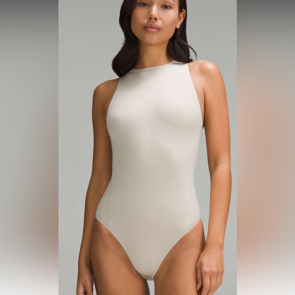 187. NWT Lululemon Wundermost Ultra-Soft Nulu High-Neck Bodysuit
Mojave Tan